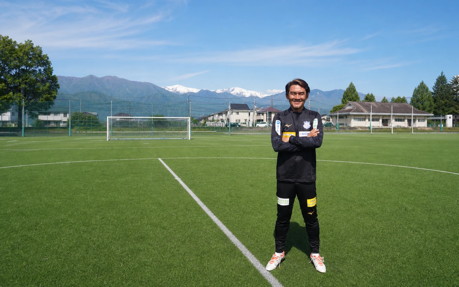 Technical Director Nazri Nasir standing on a football pitch